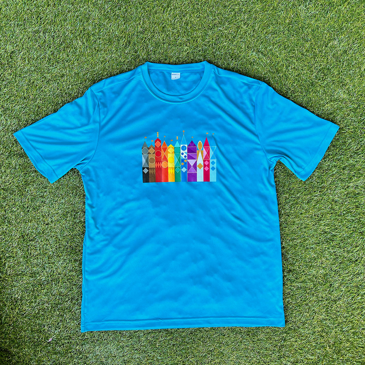 Small World After All 100% polyester shirt-Pride edition, atomic blue